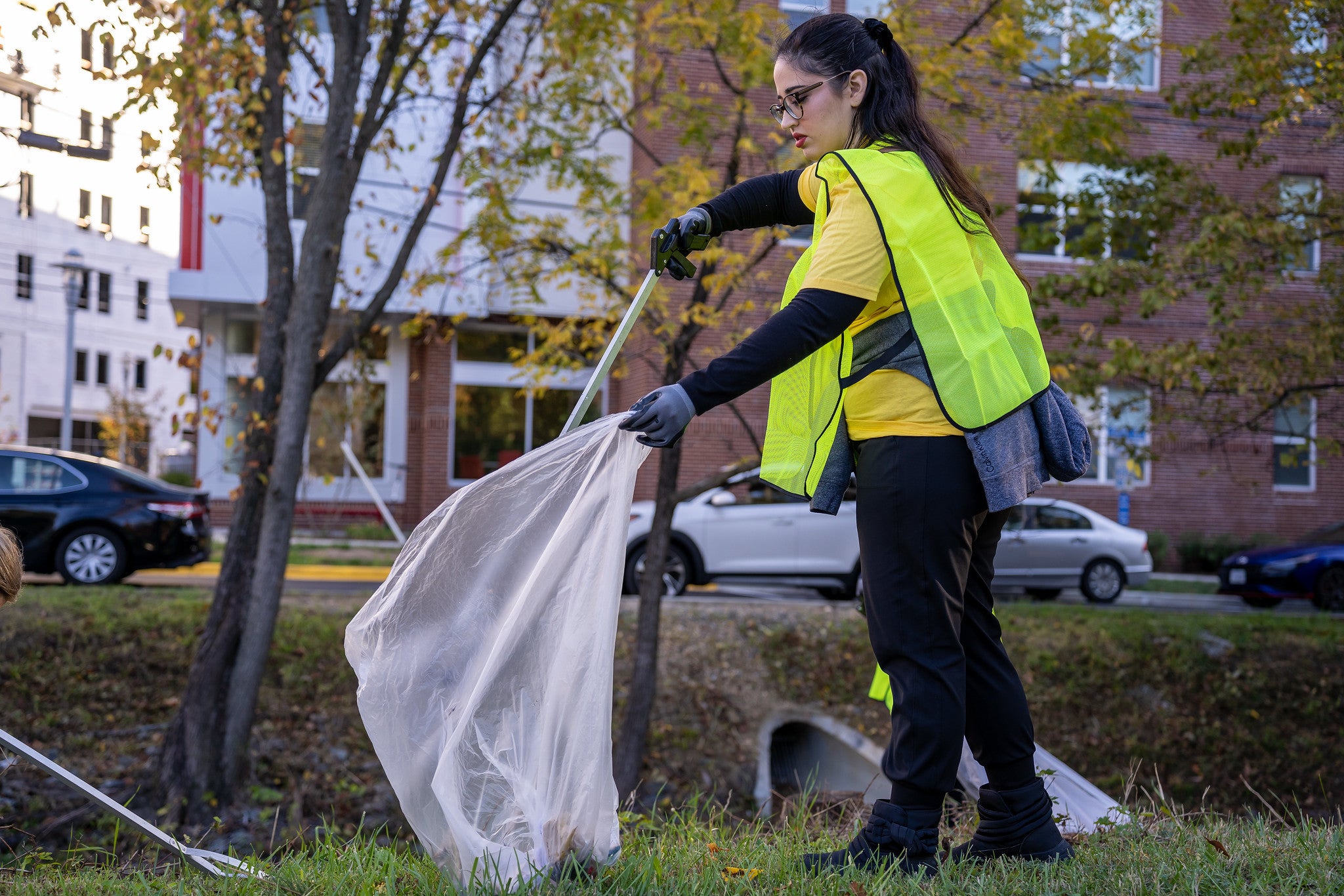 volunteer picking up trash